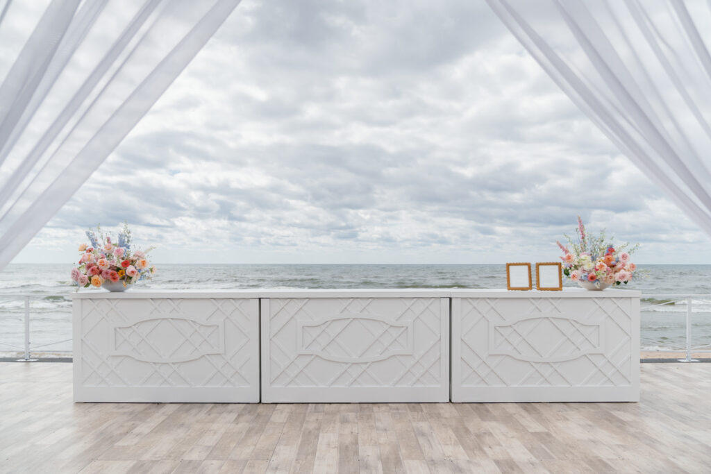 Tented lakefront wedding with floral details. Northern Michigan Weddings